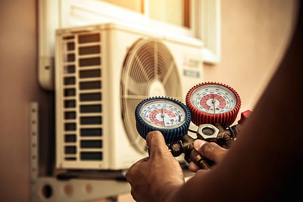 Professional Heat Pump Repair technician working in Traverse City, MI